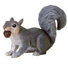 a statue of a squirrel with its mouth open and eyes wide open, on a white background