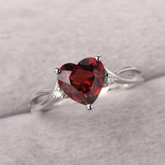 ◆ The ring is handcrafted from sterling silver and decorated with a dazzling 8*8 mm garnet and CZs. It is suitable for engagement/anniversary/daily occasion. ◆ Production Description: Main stone Type: Natural Garnet Main Stone Shape: Heart Cut Main Stone Size: 8*8 mm(2.44ct) Side stone: CZ Metal: 925 Sterling silver - Other options available in the drop down menu ◆ Customization: √Free for Add Engraving √Other Metal Type Available √Other Gemstones & Shapes Available √Personalization Requests Ava Garnet Heart Ring, Garnet Ruby Ring For Promise, Promise Ring With Lab-created Ruby And Accent Stones, Fine Jewelry Garnet For Promise, Anniversary Birthstone Ring With Center Stone And Lab-created Ruby, Elegant Garnet Solitaire Birthstone Ring, Promise Lab-created Ruby Birthstone Ring, Anniversary Lab-created Ruby Birthstone Ring With Center Stone, Fine Garnet Jewelry For Promise Occasions