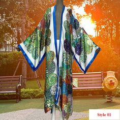 Summer kimono beach wear women Africa dress bikini cover up Cardigan print abayas, Plus size Beach cover up outfits for women, gift for her * Style: Young Style * Material: Polyester * Young Style: Bohemian * Size: length 145cm (57 inches)/ bust: 130 cm/51.2 inches * Note: 1. Please help me check size before ordering. Because Items measured by hands; they may be 2-4cm differences. (All measurement in cm and please note 1cm=0.39inch 1 inch=2.54cm ) 2. Because of lighting effects, the color of shi Cover Up Outfits, Kimono Beach, Plus Size Beach, Africa Dress, Summer Kimono, Womens Robes, Outfits For Women, Beachwear For Women, Beach Covers