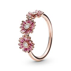 From Pandora, bring flower power to your style with this flower crown-inspired Pink Daisy Flower Trio Ring. The daisy band ring is finished in 14k rose gold-plated unique metal blend and features three enamel flowers with cubic zirconia in the center. The hand-painted finish brings the vibrant petals to life with delicate shading. Inspired by the daisy, a flower which blooms in adversity and represents freedom, the ring serves as a stylish reminder to stay true to who you are. This ring is a siz Pink Daisy Flower, Playful Jewelry, Pandora Ring, Pandora Pink, Pandora Rose, Trio Ring, Charms Pandora, Daisy Ring, Pandora Rings