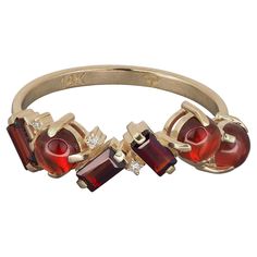 14k gold ring with garnets and diamonds Metal: 14k gold Weight: 1.94 g. depends from size Central stones: Garnets 1. Cut: baguettes, 3 pieces, weight: approx - 0.45 ct, color: red. Clarity: Transparent with inclusions 2. Cut: round cabochon, 3 pieces, weight: approx - 1.2 ct (3 x 0.4 ct), color: red. Clarity: Transparent Diamonds: G/VS, brilliant cut, weight: 0.04 ct (4 x 0.01 ct). Minimalist Diamond Rings, Garnet And Diamond Ring, Gold Heart Ring, Statement Rings Diamond, Diamond Fashion Rings, Vintage Style Rings, Rings Fashion, Star Jewelry, Color Rojo