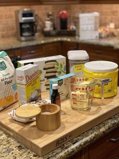 the kitchen counter is covered with various ingredients