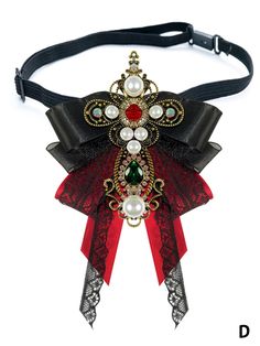 Elevate your outfit with our stunning Baroque-inspired Beads and Rhinestones Brooch or Bow Tie. Available in a striking black or red color, this exquisite accessory features intricate detailing and a cross design, adding a touch of vintage glamour to your look. Whether you choose to adorn your lapel or collar with this statement piece, it's the perfect way to showcase your unique style.   Please note that this product includes only one brooch or bow tie. Victorian Jeweled Brooches For Party, Gothic Brooch Jewelry For Parties, Gothic Party Brooch Jewelry, Red Embellished Party Jewelry, Elegant Black Jewelry For Costume Party, Red Beaded Brooch For Party, Elegant Red Holiday Brooch, Elegant Red Holiday Brooches, Tie Brooch