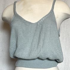 Soft Knot Top. V Neck In Front With Delicate Accent. Ribbed At Waistline. Gray Knit Tops For Summer, Blue Open Knit Top For Layering, Light Blue Pointelle Knit Top, Gray Knit Top For Summer, Casual V-neck Top, One Size, Casual One Size V-neck Top, Blue V-neck Top, Light Blue Knitted Top For Spring, Casual Light Blue Pointelle Knit Top