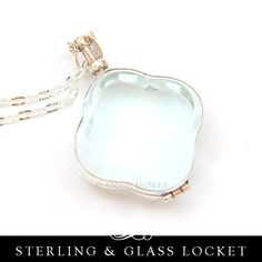 "Gorgeous Trefoil Clover Glass Locket necklace with Sterling Silver trim and antique glass. The inside has room for two photos back-to-back, or a thin memento.  The glass is clear with a slight color cast to it. The Trefoil Clover shaped locket features a swiveling bail so the contents can be viewed from either side.  The small nut at the top unscrews to open the locket.  Purchase includes 1 sterling silver glass locket, 25mm diameter inside the locket and the glass is about 1/2\" thick. The spa Clear Locket Necklace, Glass Locket Pendant, Wedding Bouquet Charms, Bouquet Charms, Glass Locket, Wedding Pendant, Silver Glass, Photo Locket, Gorgeous Glass