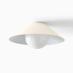 a white light hanging from the side of a wall mounted ceiling fixture with a cone shaped shade