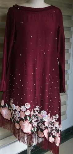 Product Description:  A delicate Maroon shirt with hangings and hand embellishment. Color: Maroon Can be customized in any color Includes:  Shirt Only Long Sleeve Blouse With Pearl Embroidery For Wedding, Long Sleeve Wedding Blouse With Pearl Embroidery, Hand Embellished Long Sleeve Kurta For Eid, Hand Embellished Long Sleeve Kurta For Wedding, Elegant Hand Embellished Long Sleeve Kurta, Elegant Long Sleeve Hand Embellished Kurta, Hand Embellished Long Sleeve Blouse, Hand Embellished Long Sleeve Wedding Kurta, Festive Long Sleeve Blouse With Pearl Embroidery