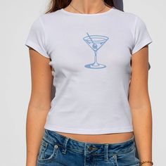 Martini Baby Tee 🍸🎀 Perfect for your summer wardrobe  Thank you for shopping at By Basha!! If you choose to purchase something your order is greatly appreciated 💖 D E S C R I P T I O N  ✸ made with 100% cotton (micro) ribbed baby tee ✸ classic baby tee fit ✸ crew neckline ✸ made in the U.S. S I Z I N G  Since every body is different, please use the size guide to determine which size is best for you.  These are women's baby tees and run true to size. If you're unsure what size to get take a lo Baby Tee Sayings, Light Pink Baby Tee, Romantic Blue Baby Tees, Martini Graphic, Pacsun Baby Tee, Y2k Shirts Baby Tees, I'm Just A Girl, Baby Tees, P T