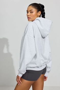 This ultra soft fleece hoodie is perfect for your lazy day mood <3 Features - Ultra soft fleece interior - Ribbed cuffs and hem Size & Fit - Fit: Oversized - Length: Long - Model is wearing size S Materials & Care - Content: 75% cotton, 25% recycled polyester - Care: Machine wash, cold - Imported Comfortable Gray Sweats With Ribbed Cuffs, Comfy Sweats With Ribbed Cuffs, Cozy Hoodie With Ribbed Cuffs For Lounging, Cozy Gray Sweats With Ribbed Cuffs, Cozy Fleece Sweats With Soft Texture, Heather Grey Cozy Sweats With Ribbed Cuffs, Cozy Heather Grey Sweats With Ribbed Cuffs, Cozy Hoodie With Drawstring For Lounging, Cozy Lounging Hoodie With Drawstring Hood