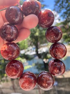 Material: Natural Red Hematoid Lepidocrocite Quartz beads  size :  21mm   quantity: one strand 6mm approx 29 pcs one strands 7mm approx25 pcs one strands 8mm approx 22 pcs one strands 9mm approx 21pcs one strands 10mm approx 19 pcs one strands 11mm approx 18pcs one strands 12mm approx 16 pcs one strands 13mm approx 16 pcs one strands 14mm approx 15 pcs one strands 15mm approx 14pcs one strands 16mm approx 14 pcs one strands 17mm approx 13pcs one strands 18mm approx 13pcs one strands 19mm approx Amber Beaded Bracelets With Polished Beads As Gift, Amber Beaded Bracelets As Gift, Amber Beaded Bracelets For Gift, Red Beaded Bracelets With Gemstone Beads, Healing Bracelets With Large Beads, Large Beaded Round Crystal Bracelet For Gift, Red Beaded Crystal Healing Bracelet, Round Bracelets With Large Beads As Gift, Amber Beaded Bracelets With Large Beads As Gift