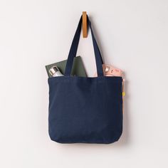 A super-cute, mini tote bag. Machine washable. Sustainably and ethically handmade with 100% certified organic cotton. Slouchy Bag, Backpack Lunch Bag, Navy Baby, Mini Tote Bag, Snack Bags, Satchel Tote, Natural Baby, Mini Tote, Zip Pouch