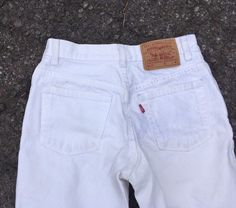 "Beautiful vintage 1990s Levis 517 jeans. 100% cotton denim in classic white. So good for a monochrome white outfit or pair with a vintage chambray top. These can be dressed up or down easily depending on how you style them. 517 model, slim fit boot cut. Made in USA. High waist hits slightly below belly button- not as high as an early 90s ribcage fit. Slim leg with slight flare at hem, more versatile than a full bell bottom. Vintage size 5 jr M. Fits estimated modern XS/S depending on desired fi Classic White Cotton Flare Jeans, Vintage White Streetwear Bottoms, Vintage White Bottoms For Streetwear, Vintage Style White Bottoms For Streetwear, White 90s Jeans For Spring, Vintage High Rise White Bottoms, Classic White Jeans For Streetwear, Classic White Fitted Flare Jeans, White Classic Streetwear Bottoms