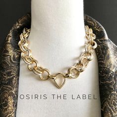 Be unique, bold and beautiful in this fabulous gold and silver designer chain choker.  Elevate your day and expect lots of compliments!  I have always been a lover of mixing metal. Blending gold and silver elements has always been a winning combination for me. It looks spectacular and elegant. The quality is excellent, Nickel Free and lightweight.  The italian craftsmanship exceptional and without doubt they wrote the book on style. The company I work with are one of the oldest and most respected in Italy and many high end designers create chain at this workshop. I've combined the chain with a cute teardrop cz pave hinge clasp which adds another layer of elegance. Versatile as you can feature it at the front as a focal piece, side or back of the neck. My shipment has just arrived from Ital Gold Chain Link Choker For Party, Silver Choker With Gold Chain For Gift, Chunky Gold Metal Necklace, Bold Gold Metal Jewelry, Bold Chunky Jewelry For Gifts, Bold Chain Link Necklace For Gift, Chunky Chain Choker Necklace As A Gift, Chunky Chain Choker Necklace For Gift, Chunky Metal Chain Necklace As Gift