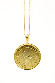 THE SUDAN Nubian Pyramid Coin Necklace is handcrafted based on an authentic Sudanese coin using the traditional lost-wax casting technique. The coin features the Meroe Pyramid, one of several pyramids built by the rulers of ancient Kushite Kingdoms in the Nile Valley. Present day Sudan was home to three Kushite kingdoms during antiquity; the first having a capital in Kerma (2500-1500 BC), the second in Napata (1000-300 BC), and the third in Meroe (300BC - 300 AD). This area of the Nile Valley wa Diamond Anklet, Ancient Pyramids, Wedding Gifts For Men, Popular Necklaces, Heritage Jewellery, 2023 Vision, The Nile, Wax Casting, Infinity Necklace