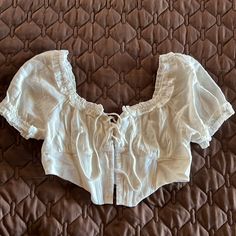 Nwt Womens Blouse By Pacsun Features Puff Sleeve And Tie Top. The Waist Is Detailed With A Corset Bustier Style. Muse Of Music, Corset Bustier, Pacsun Tops, Tie Top, Cabinet Design, Blouse Top, Kitchen Cabinet, Pacsun, Pretty Outfits