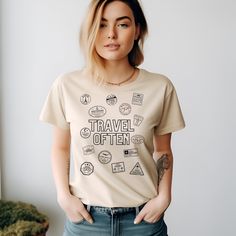 Embark on a journey around the world with our Travel Often Passport Stamps Travel Shirt, designed for the avid traveler and adventure seeker. Crafted from premium heavy cotton, this unisex tee ensures both comfort and durability for your explorations. With multiple color choices available, it's the perfect apparel for any wanderlust-driven adventure or travel-inspired outfit. About: The unisex heavy cotton tee is the basic staple of any wardrobe. It is the foundation upon which casual fashion gr Lover Outfit, Travel Tshirt, Adventure Seeker, Passport Stamps, Travel Shirt, Travel Wardrobe, Europe Travel Tips, Travel Inspired, Travel Lover