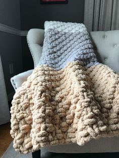 a couch with a blanket on top of it