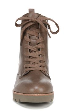 This classic combat boot with a cushioned EVA footbed and lightweight sole is a comfy go-to for grounding casual looks. 1 1/2" heel; 1" platform (size 8.5) 6" shaft Leather upper/textile lining/synthetic sole Imported Brown Lace-up Platform Combat Boots, Fall Combat Boots With Reinforced Heel And Medium Width, Casual Leather Lace-up Wedge Boots, Fall Lace-up Combat Boots With Padded Ankle, Fall Platform Combat Boots Medium Width, Fall Ankle-high Combat Boots With Lug Sole, Casual Combat Boots With Lug Sole For Fall, Fall Medium Width Platform Combat Boots, Ankle-high Combat Boots With Lug Sole For Fall