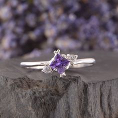 Amethyst Silver Ring, Dainty Promise Silver Ring, Unique Womens Amethyst Ring, Silver Art Deco Ring, Princess Cut Ring, Purple Stone Ring WE OFFER UNLIMITED PERIOD INSTALLMENTS PLAN This is a beautiful, stunning, feminine ring that works well for all occasions, styles, and ages. You will love it! Ring information: Main stone: Amethyst Approximate size: 4*4mm Accent stones: White cubic zirconia Metal type: Silver Metal stamp: 925 Sterling Silver Installment Payments We offer installment payments Purple Sapphire Promise Ring In Fine Jewelry, Purple Sapphire Ring For Promise, Purple Diamond Promise Ring In Fine Jewelry Style, Purple Amethyst Promise Ring In Fine Jewelry Style, Purple Sapphire Promise Ring Fine Jewelry, Purple Birthstone Stackable Rings For Wedding, Purple Open Ring Birthstone For Anniversary, Purple Birthstone Open Ring For Anniversary, Purple Three Stone Wedding Jewelry