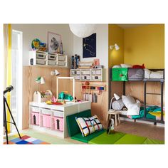 a child's bedroom with bunk beds and toys