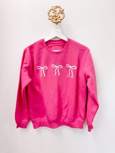 Blushing Bow Kids Crewneck | Sassy Shortcake | sassyshortcake.com Pink Feminine Sweater For Loungewear, Pink Bow Top For Fall, Preppy Pink Tops For Fall, Casual Crew Neck Top With Pink Bow, Cute Pink Sweatshirt For Gift, Cute Pink Sweatshirt As Gift, Pink Top As Gift For Fall, Pink Top As Fall Gift, Pink Crew Neck Sweatshirt For Gift