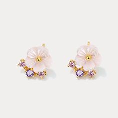 Tired of boring, plain earrings? Spice up your style with our Sakura Flower Stud Earrings! These flower stud earrings will add an adventurous touch to any outfit. Made with delicate Sakura flower designs, they are the perfect blend of beauty and nautre. Sakura blossoms are a beloved symbol of spring, renewal, and fleeting beauty in Japanese culture. Wearing these sakura flower earrings is a way to connect with this cherished tradition and carry a piece of spring with you all year round. These st Pink Flower Shaped Pierced Earrings, Delicate Pink Pierced Earrings, Flower Shaped Crystal Earrings, Delicate Pink Earrings, Anniversary Flower Single Earring, Delicate Pink Flower Earrings For Anniversary, Dainty Flower-shaped Pierced Earrings, Rose Gold Flower Bridal Earrings, Plain Earrings