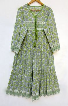 "ITEM DESCRIPTION green ethnic look printed cotton maxi dress - v neckline with tassel summer wear maxi dress - long sleeve casual maxi dress Features: Long sleeve, V neck, Long dress Material: Cotton cambric Fabric: 100% cotton soft light weight ethnic print fabrics Sleeve Length = 22 inch For more sizes & their measurement, please refer our below chart to understand the sizes variations available with us For your size requirement, please mention your size in seller note at the time of buying. Traditional Green Long Sleeve Maxi Dress, Traditional Long Sleeve Green Maxi Dress, Green V-neck Maxi Dress With Tassels, Green Maxi Dress With Tassels, Green Cotton V-neck Maxi Dress, Green Bohemian Printed Maxi Dress, Green Bohemian Maxi Dress With Print, Green Boho Print Long Maxi Dress, Green V-neck Cotton Maxi Dress