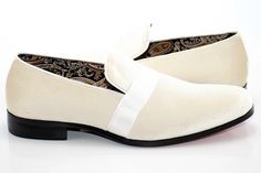 Soft velvet covers the upper of this loafer that features finely detailed interior lining topped by a grosgrain strap, giving it the versatility to be worn with either casual or semi-formal outfits. A luxurious way to cap your favorite formal or semi-casual outfits. Velvet Upper Rubber Sole Grosgrain Strapped Upper Slip-On Plain-Toe Imported Elegant Cream Slip-ons, Elegant Cream Loafers For Business, Elegant Formal Slip-ons For Spring, Elegant Cream Business Loafers, Elegant Semi-formal Slip-ons For Spring, Elegant Semi-formal Spring Slip-ons, Formal Cream Loafers With Leather Sole, Cream Formal Loafers With Leather Sole, Cream Leather Sole Loafers For Formal Occasions