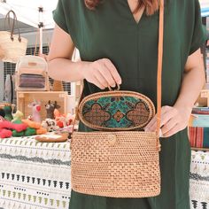 Exude timeless elegance with the Bali Rattan Crossbody Bag - Postman Messenger Bag. Crafted from the finest Ata grass and real leather, this handcrafted piece features a compact yet practical design. The adjustable strap, made from nude real leather, allows for effortless carrying of your essentials in style. This bag gracefully sits at your side, complementing your outfit with sophistication. Natural Satchel With Mobile Phone Bag For Daily Use, Natural Color Clutch Shoulder Bag With Detachable Strap, Natural Handheld Straw Bag With Mobile Phone Holder, Natural Color Crossbody Shoulder Bag With Removable Pouch, Natural Crossbody Shoulder Bag With Removable Pouch, Natural Color Clutch Bag With Adjustable Strap, Natural Straw Crossbody Bag With Phone Pocket, Natural Pouch Satchel With Adjustable Strap, Natural Clutch Shoulder Bag With Leather Handles