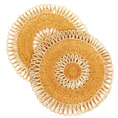 three woven placemats with spiral designs in gold and white on a white background