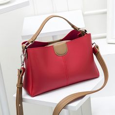 Handbags Type : Shoulder Bags  Types of bags : Shoulder & Handbags  Main Material : Split Leather  Shape : Satchels  Closure Type : zipper  Hardness : SOFT  Style : vintage  Interior : Cell Phone Pocket  Occasion : Versatile  Colour: Red, Wine Red, Black, Khaki,Blue......