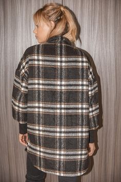 We can't wait for cold weather so we can rock the BB Dakota Plaid Times Black Multi Plaid Coat! Brushed plaid wool, in hues of cream and beige, shapes this cozy coat that has a collared neckline and long balloon sleeves with extra-long stretchy cuffs. The slightly oversized silhouette ends at a rounded, notched hem and is completed with a hidden zipper down the center and diagonal flap pockets. Snap button closures at the collar and hem. Fit: This garment fits true to size. Length: Mid-thigh. Si Winter Plaid Collared Shacket, Plaid Wool Outerwear For Cold Weather, Collared Plaid Winter Outerwear, Plaid Collared Outerwear For Winter, Plaid Wool Outerwear For Winter, Winter Plaid Wool Outerwear, Plaid Wool Coat For Winter, Winter Wool Plaid Outerwear, Plaid Outerwear For Cold Weather In Fall