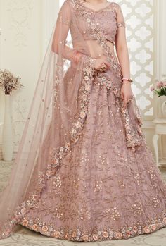 Latest Designer Bridal Wedding Wear Lehenga Choli. LEHENGA FABRIC: Net with Banglori Silk BLOUSE FABRIC: Net with Banglori Silk DUPATTA: Net COLOR: Dusty Pink WORK: Embroidery Bonus offer - Receive a free mystery gift with your order. Stitching Option - We will email you the measurement guide to confirm your size. SHIPPING: The product will be shipped within 1 - 2 weeks from the date of purchase. Product is returnable if un-Stitched This product qualifies for free shipping For any Rush/Urgent or Pink Lengha, Gold Lehenga, Lehenga Online, Lehenga Style, Net Lehenga, Lehenga Choli Online, Pink Lehenga, Asian Bridal, Designer Lehenga