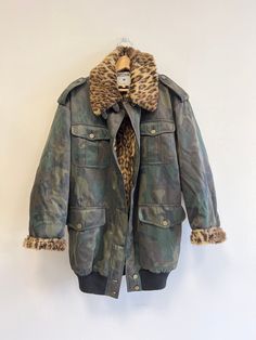 Moschino Jeans blazer jacket coat, leopard collar faux fur, darg green camouflage, Moschino Jeans vintage faux fur leopard viscose jacket I offer vintage MOSCHINO JEANS coat/ jacket inside faux fur leopard print Made in Italy size on tag I40 (italian size) 4 pockets viscose 40% acetat 30%  cotton 30% used in very good vintage condition full length  81 cm/ 31.89 inch width armpit to armpit 61 cm/24.02 inch length sleeves 55 cm/21.65 inch (or shorter, you can roll up the sleeves more) If you have Winter Leopard Print Outerwear With Pockets, Leopard Print Outerwear With Faux Fur Trim, Winter Leopard Print Faux Fur Outerwear, Winter Leopard Print Outerwear With Faux Fur Trim, Fall Leopard Print Outerwear With Faux Fur Trim, Vintage Leopard Print Winter Outerwear, Vintage Leopard Print Outerwear For Winter, Vintage Camouflage Winter Outerwear, Vintage Long Sleeve Leopard Print Outerwear