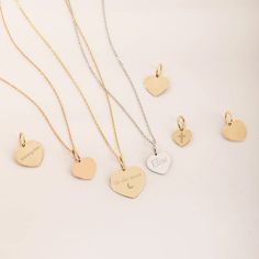 "14K 18K Solid Custom Engraved Heart Necklace, Personalized Dainty Gold Pendant, 2 Side Personalized Date Name Heart Pendant Gift for Her/Him ► Adding a customized tiny bar at clasp may be a good idea: https://etsy.me/3cn9OQ5 Material: Solid Gold (real gold, no gold-filled or no gold plated material) Karat: 14K (585), 18K (750) Available Gold Colors: Yellow, rose and white Available chain thickness: 0.84mm, 0.95mm Available Heart pendant size (width): 10mm, 12mm, 14mm The pendant can be engraved  2 sided upon request.  You can customize the chain length from 14\" to 20\". The \"cable chain\" is used for this necklace. You can write for longer and different chain options. Chain Length - 14 inches (choker) Chain Length - 16 inches adjustable 15 inches (choker) Chain Length - 18 inches adjust Dainty Open Heart Engraved Charm Necklace, Dainty Engraved Open Heart Charm Necklace, Personalized White Gold Charms For Valentine's Day, Elegant Engraved Charms For Mother's Day, Engraved White Gold Charms For Anniversary, Rose Gold Heart Charm, 14k Gold Heart Charm Pendant, Gold Heart-shaped Engraved Charms, Gold Engraved Heart Charms