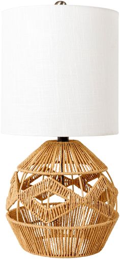 a wicker lamp with a white shade on it