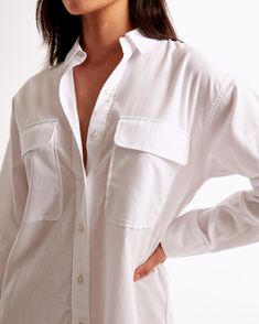 Elevate your wardrobe with the timeless elegance of Abercrombie & Fitch's Women's Oxford Mini Shirt Dress. This chic piece combines functionality and style, perfect for any occasion.

- Size: XL TALL
- Color: White
- Material: Cotton, Polyester
- Gender: Female
- Features: Functional button-through detail, chest pockets with flap closure, classic collar

Crafted from a blend of cotton and polyester, this dress ensures both comfort and durability. The classic collar and button-through detail add Shirt Dress With Pockets, Female Features, Casual Meeting, Dress Shirts For Women, Mini Shirt Dress, Oxford Fabric, Oxford Shirt, Dress With Pockets, White Material