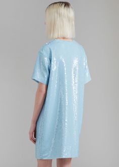 Color: Sky Embroidered sequin fabric Relaxed fit Mini length Round neckline Concealed zipper on sleeve Short sleeves Lined 100% Polyester Lining: 57% Viscose 43% Polyester Dry Clean Only By The Frankie Shop. Imported *All finishings on neckline and hem done by hand Fitted Sequin Dress With Crew Neck, Sequin Tee, The Frankie Shop, Frankie Shop, Sequin Fabric, Round Neckline, Sequin, Dry Clean, Short Sleeves