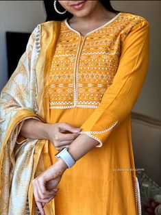 Embrace elegance and comfort with our Pure Cotton Slub Yellow Suit. Made from high-quality cotton slub fabric, adorned with intricate embroidery and delicate crocia lace detailing. The pants and 2.4-meter khadi silk dupatta complete this stunning ensemble. Keep it pristine with a gentle hand wash. Yellow Outfit Summer, Indian Suit, Yellow Suit, Organza Sarees, Yellow Outfit, Indian Suits, Tussar Silk Saree, Intricate Embroidery, Silk Dupatta