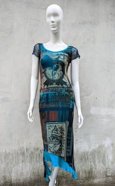 "Very cool mesh dress abstract print from Save The Queen. The dress is lined in blue mesh fabric, and has an asymmetrical hem. Size tag M, fits S-L best (see measurements ) Condition 9/10 (good vintage condition) Made in Italy Underarm to underarm - cm/\" (the mesh stretches) Length from the back - cm/\" (the mesh stretches) All measurements taken with garment lying flat. Vintage sizes vary greatly! We recommend comparing measurements with a similar style garment you own for best fit! If you hav Save The Queen Top, Save The Queen Clothing Italy, Fitted Blue Mesh Dress For Summer, Blue Fitted Mesh Dresses, Blue Sheer Mesh Dress, Fitted Blue Mesh Dress, Early 2000s Fashion Aesthetic, Vintage Gaultier, Save The Queen Dress