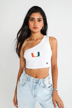 The Senior Top! This one shoulder top is the perfect trendy piece for game days or hanging out on campus! Made with top quality ribbed fabric that adjusts to every body type. SIZING AND DETAILS Sizing: XS-XXL One shoulder design Cropped fit 100% Cotton Rib Embroidered logo application P.S. We’d love to see you repping this style! Make sure to tag us (@hypeandvice) to be featured :) Outfits For Miami, Trendy College Outfits, Classy Fall Outfits, Miami Outfits, Logo Application, Beach Night, One Shoulder Top, University Of Miami, Gameday Outfit