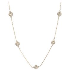 18K yellow gold chain style necklace with diamond stations. The stations are in a diamond shape with each station containing eight round diamonds. The 168 round diamonds total 5.90 carats, G-H color and VS1-VS2 clarity. The necklace measures 43 inches in length. Marked "750" on the clasp. Chain With Diamonds, Gold Long Chain, Diamond Chain Necklace, Necklace With Diamond, 18k Gold Chain, Long Chain Necklace, White Gold Necklaces, Diamond Chain, Station Necklace