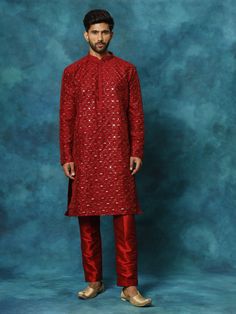 Vastramay Men's Maroon Silk Blend Kurta Pyjama Set This elegant Vastramay Men's Maroon Silk Blend Kurta Pyjama Set is perfect for festive occasions and traditional events. The rich maroon color combined with the smooth silk blend fabric ensures a stylish and comfortable look. Features Stylish maroon kurta with intricate design Comfortable pyjama for a perfect fit Ideal for festive and traditional occasions Available in various sizes Specifications Brand: Vastramay Color: Maroon Fabric: Silk Blen Long Sleeve Dabka Kurta For Celebration, Long Sleeve Sherwani For Puja And Festivals, Celebration Long Sleeve Kurta With Dabka Detailing, Celebration Long Sleeve Kurta With Dabka, Celebration Kurta With Dabka Embroidery, Festive Long Sleeve Sherwani For Puja, Festive Long-sleeve Sherwani For Puja, Long Sleeve Bandhgala For Festivals, Festival Long Sleeve Bandhgala For Puja