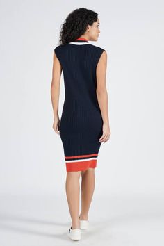 Navy knitted dress featuring contrast stripes on neckline and hem.
Components: 1
Type Of Work: Striped
Neckline: V Neck
Sleeve Type: Sleeveless
Fabric: Viscose, Nylon
Color: Blue
Other Details: 
Bodycon silhouette
Ribbed hem and neckline
Placement logo crest
Occasion: Resort,Party - Aza Fashions Casual Sleeveless Dress With Contrast Trim, Sleeveless Dresses With Striped Hem, Sleeveless Striped Hem Dress, Chic Sleeveless Dress With Striped Hem, Casual Sleeveless Dress With Striped Hem, Resort Party, Navy Knit Dress, Womens Knit Dresses, Knitted Dress