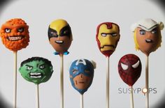 the avengers cake pops are made to look like they have different faces and expressions on them