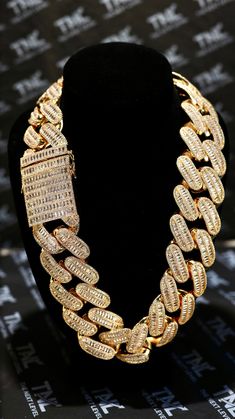 PRODUCT IS BACK IN STOCK AND READY TO SHIP - GRAB YOURS NOW BEFORE THEY'RE GONE AGAIN! 🚀🔥 We have this piece available in Silver and gold | 24 INCHES In length  Nothing says STATUS! as this beautiful 42mm iced out cuban chain. Crafted with Great attention to detail, this high-quality accessory Exudes an exquisite fusion of Cuban style and contemporary elegance. Prepare to be captivated by the dazzling brilliance of our High-Quality CZ zirconia Stones. Each stone is carefully selected to ensure maximum sparkle, creating an unrivaled radiance that catches the eye and commands attention. The precision-cut stones are set with expert craftsmanship, CAREFULLY HANDMADE ensuring that the shimmering facade of this chain stands out in any crowd. Measuring a WHOOPING 42mm, the size of the links on Streetwear Iced Out Jewelry With Cubic Zirconia, Iced Out Cubic Zirconia Jewelry For Streetwear, Streetwear Iced Out Cubic Zirconia Jewelry, Luxury Bling Jewelry For Streetwear, Luxury Gold Jewelry For Streetwear, Iced Out Chain Link Jewelry For Streetwear, Cuban Link Diamond Necklace For Streetwear, Diamond Cuban Link Necklace For Streetwear, Iced Out Cuban Link Jewelry In Cubic Zirconia