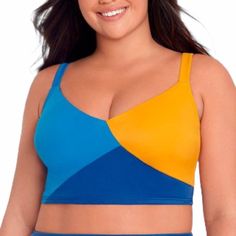 Women's Slimming Control Colorblock Crop Bikini Top - Beach Betty By Miracle Brands Blue/Yellow 2x Crop Top Silhouette Bikini Top Offers A Flattering Fit Shelf Bra With Sewn In Cups Provide Shaping And Support Pull-On Style With Adjustable Straps For A Customizable Fit Pretty Colorblock Pattern Is Easy To Mix And Match With Your Fave Swim Bottoms Upf 50+ Sizing: Womens Plus Material: 62% Nylon, 38% Spandex Material Lining: 50% Recycled Polyester & 50% Polyester Garment Style: Pullover Fitted Blue Color Block Tankini, Blue Color Block Tankini Beachwear, Blue Color Block Tankini For Poolside, Blue Color Block Tankini For Beach, Blue Color Block Tankini, Blue Color Block Sports Swimwear, Yellow Color Block Swimwear For The Pool, Yellow Color Block Swimwear For Poolside, Yellow Color Block Swimwear For Pool