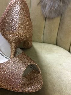 "These beautiful glitter high heels are covered in a rose gold glitter and sealed with a two step sealant that allows for movement and will not dull the shin of the glitter. This rose gold color is best described as a gold with a rose undertone. It is not an externally pink rose gold but does have a beautiful hint of pink undertones. Please note that the example heels in the photo are a size 8 shoe with a 3\" heel. Sizes 5-12 are available at checkout along with three different heel heights. All Glitter High Heels, Two Step, The Shins, Open Toe Heels, Gold Pumps, Womens Pumps, Rose Gold Glitter, Rose Gold Color, Gold Glitter