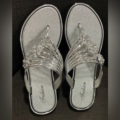 Size 8 Women’s Silver Sandals Only Tried On Never Worn. Nwot Silver Open Toe Synthetic Flip Flops, Silver Synthetic Open Toe Flip Flops, Silver Flip Flops For Spring Beach, Silver Flip Flops For Spring Beach Outings, Silver Flip Flops For Beach In Spring, Silver Open Toe Flip Flops For Party, Silver Flip Flops For Summer Parties, Elegant Silver Flip Flops For Summer, Party Silver Synthetic Flip Flops