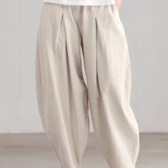 variants10 Non-stretch Solid Wide Leg Pants With Pockets, High-waist Khaki Harem Pants With Pockets, Khaki High-waist Harem Pants With Pockets, High Waist Khaki Harem Pants With Pockets, Loosely Fitted Beige Wide Leg Pants With Side Pockets, High Waist Solid Harem Pants With Pockets, Solid High Waist Harem Pants With Pockets, Baggy Beige Bottoms With Hip Pockets, Spring Khaki Harem Pants With Pockets